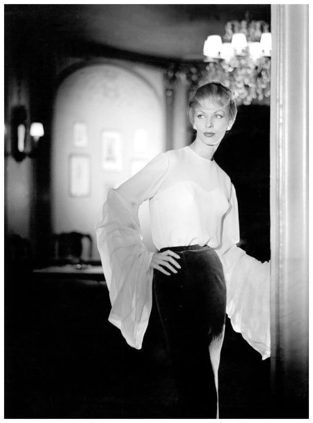 Dorothy in sheer blouse with exaggerated sleeves tucked in long silk-velvet skirt, photo by F.C. Gundlach, 1957