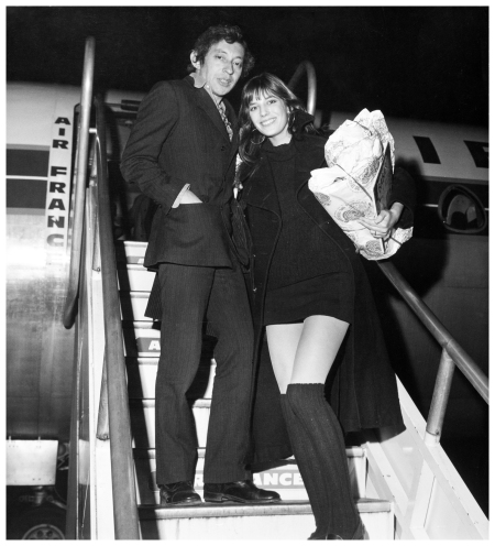 At the Orly Airport, Serge Gainsbourg and Jane Birkin boarding on a Caravelle Air France to London for Christmas, December-1969